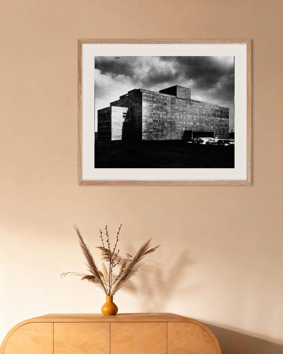 Poster of Concrete Building Under a Storm, with natural wooden frame