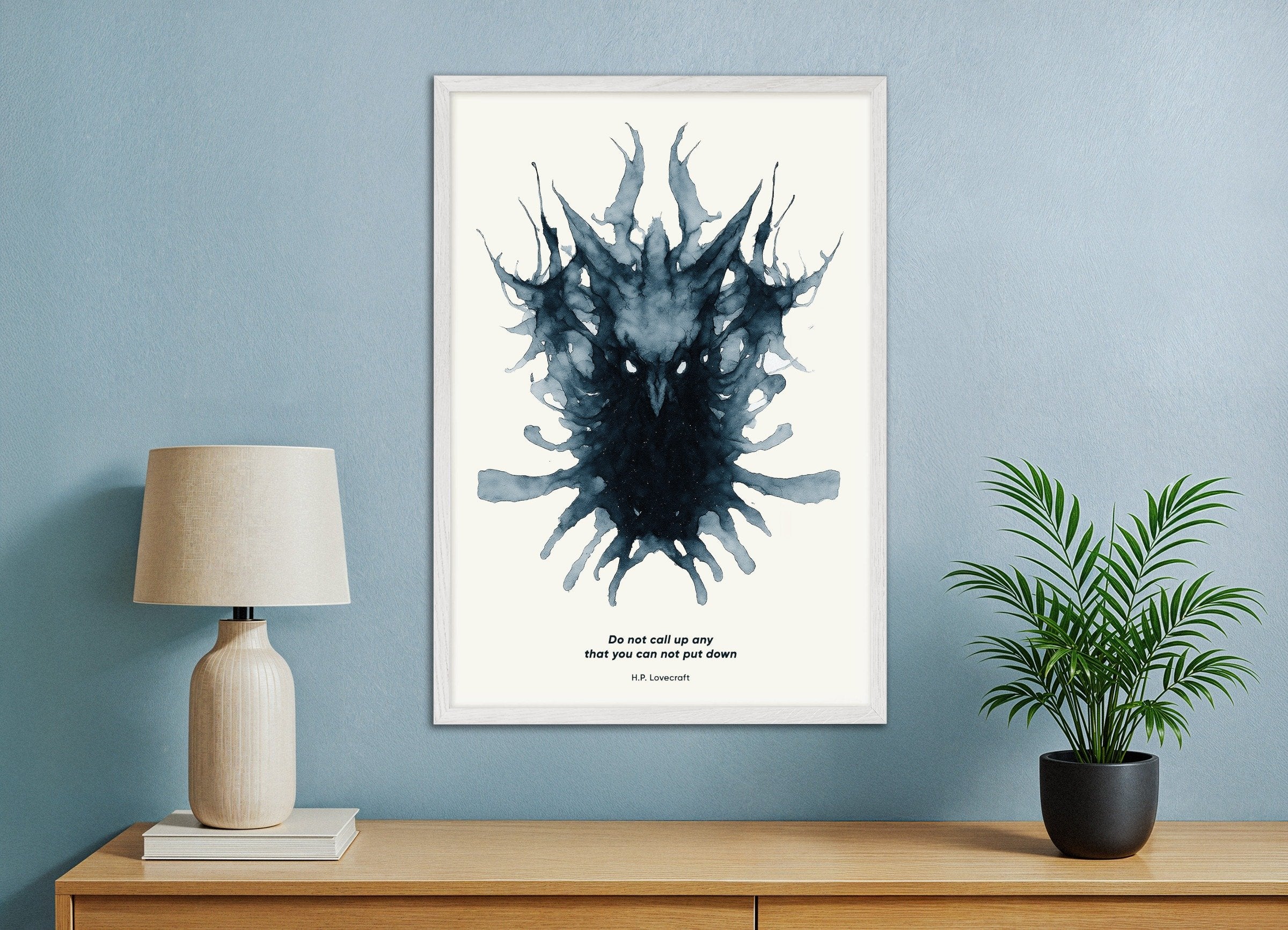 Poster of "Do Not Call Up Any That You Cannot Put Down" H.P. Lovecraft Quote Print, with white wooden frame