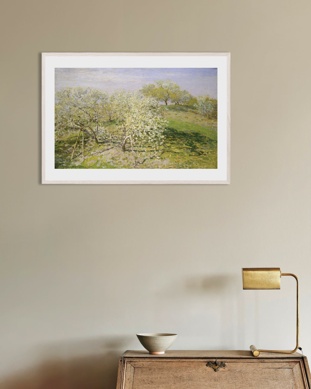 Poster of Spring (Fruit Trees in Bloom) (1873) by Claude Monet, with white wooden frame