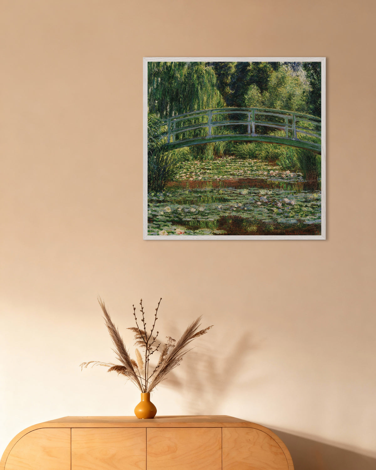 Poster of The Japanese Footbridge and the Water Lily Pool, Giverny (1899) by Claude Monet, with white wooden frame