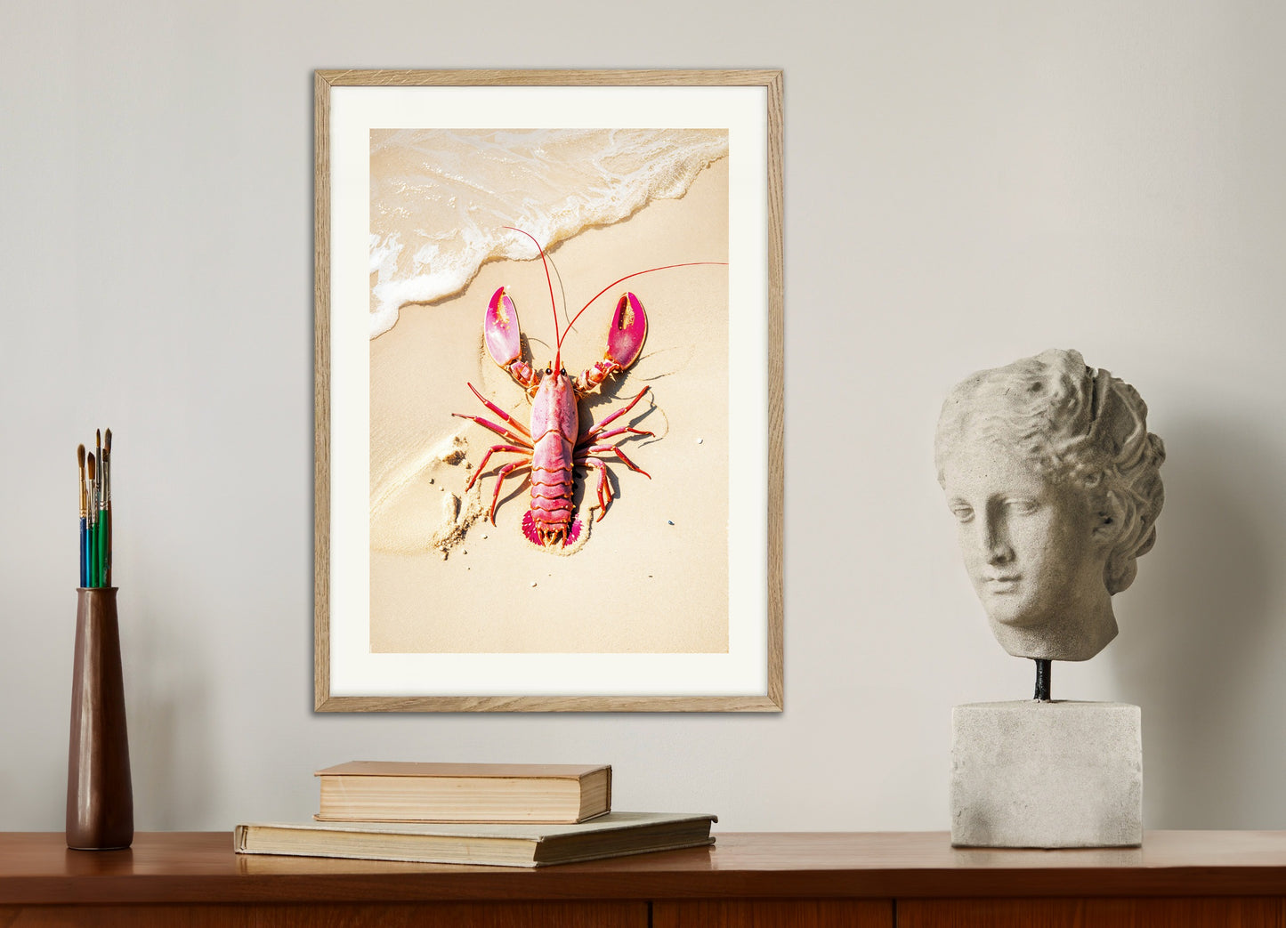 Poster with natural wood frame: Pink crayfish on a beach