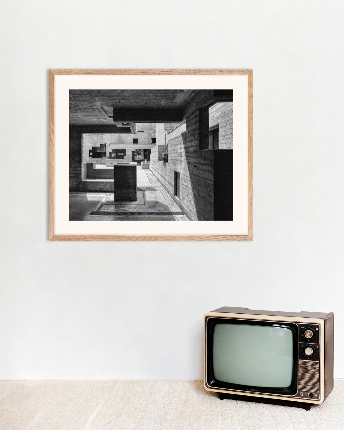 Poster of Concrete Courtyard Through a Frame, with natural wooden frame