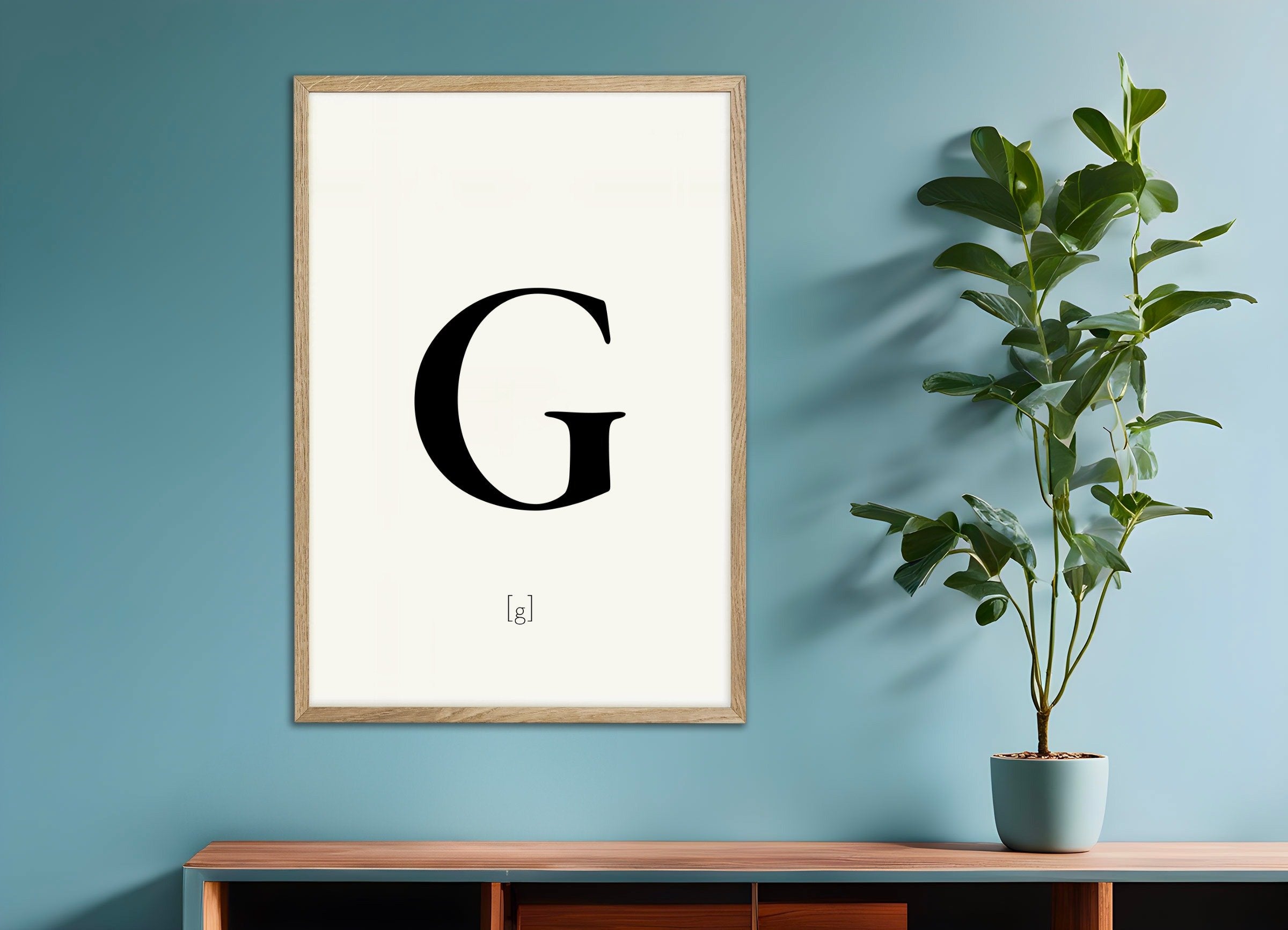 Poster of Letter G, with natural wooden frame