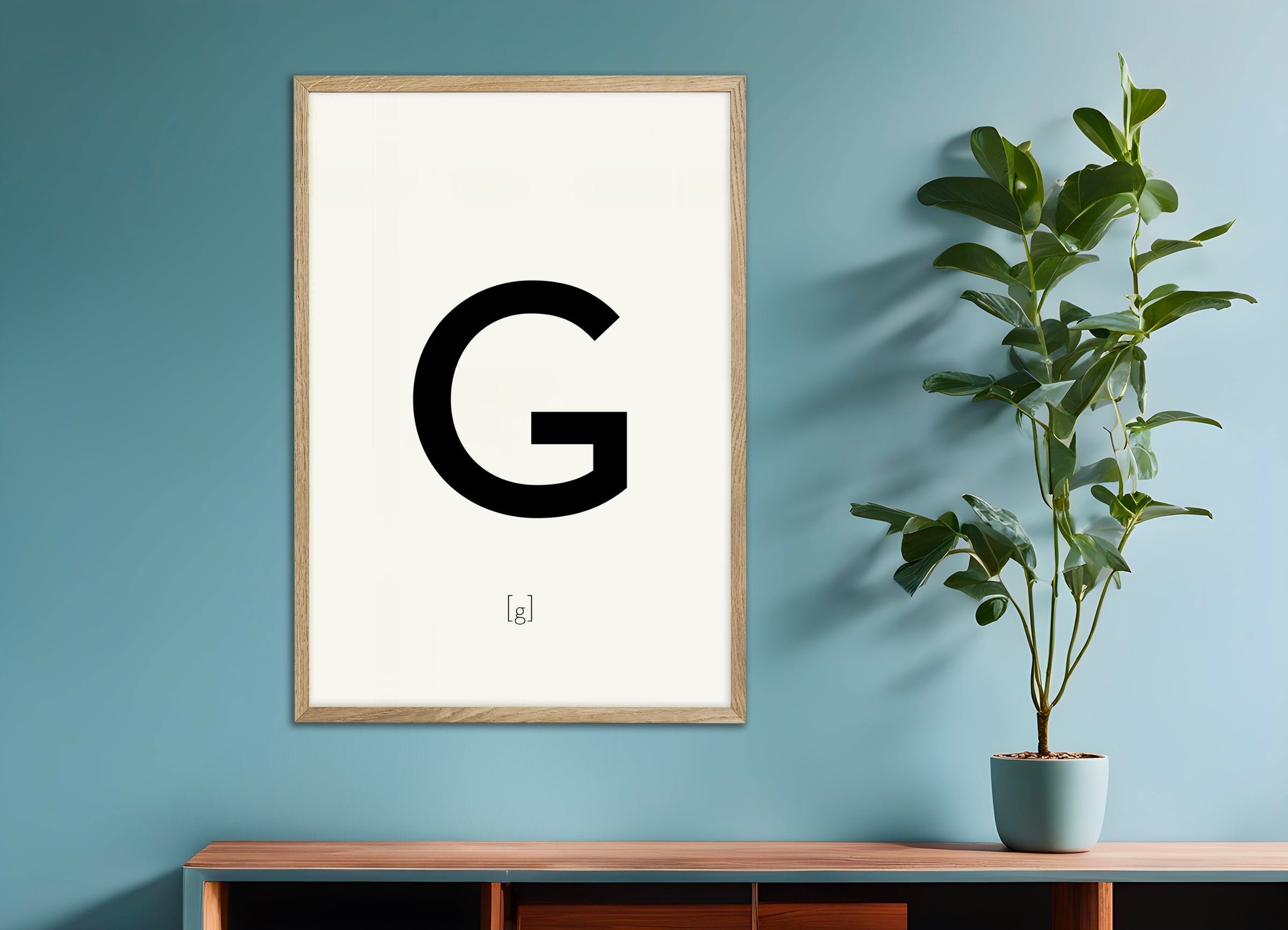 Poster of Letter G, with natural wooden frame