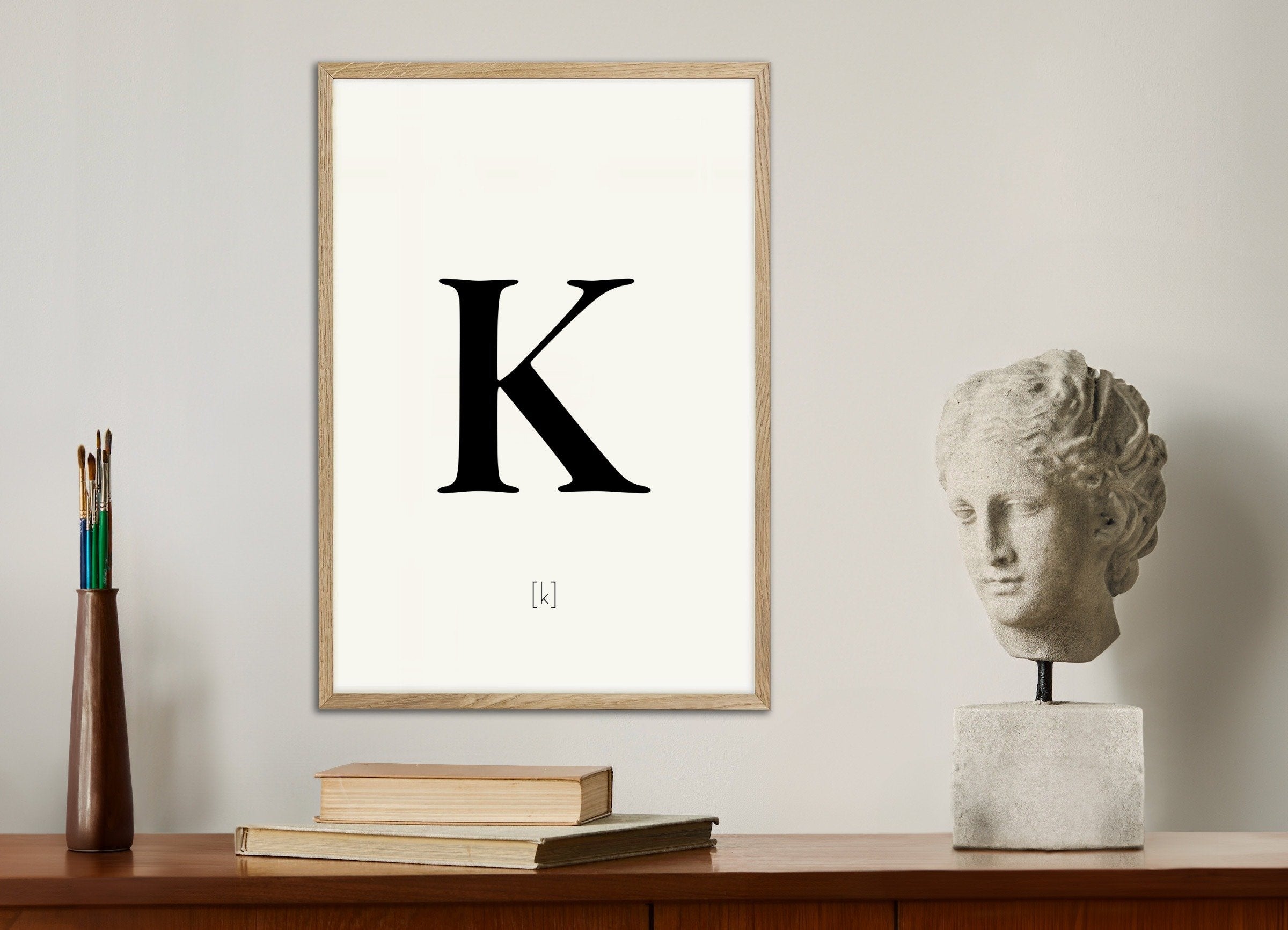 Poster of Letter K, with natural wooden frame