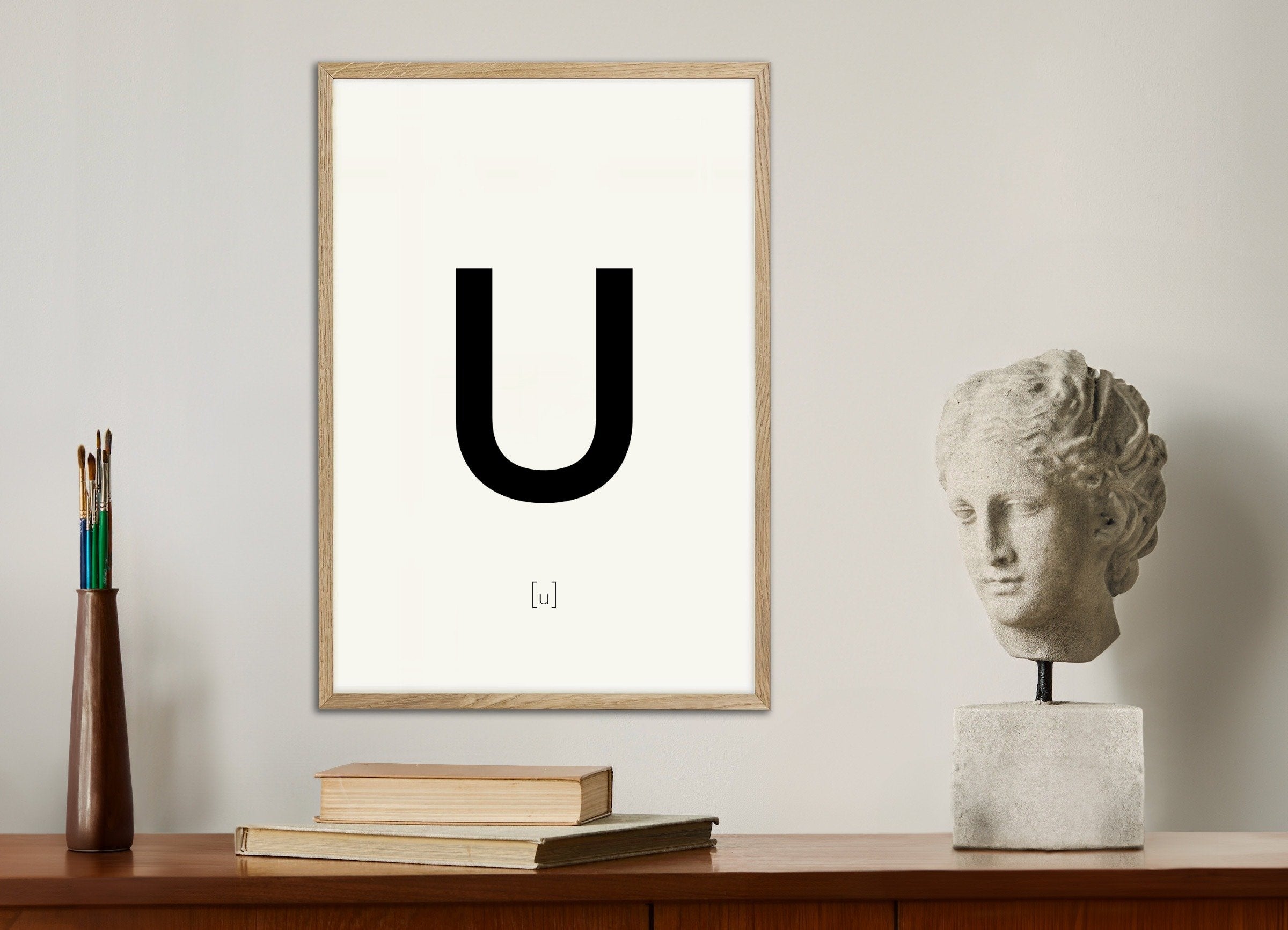 Poster of Letter U, with natural wooden frame