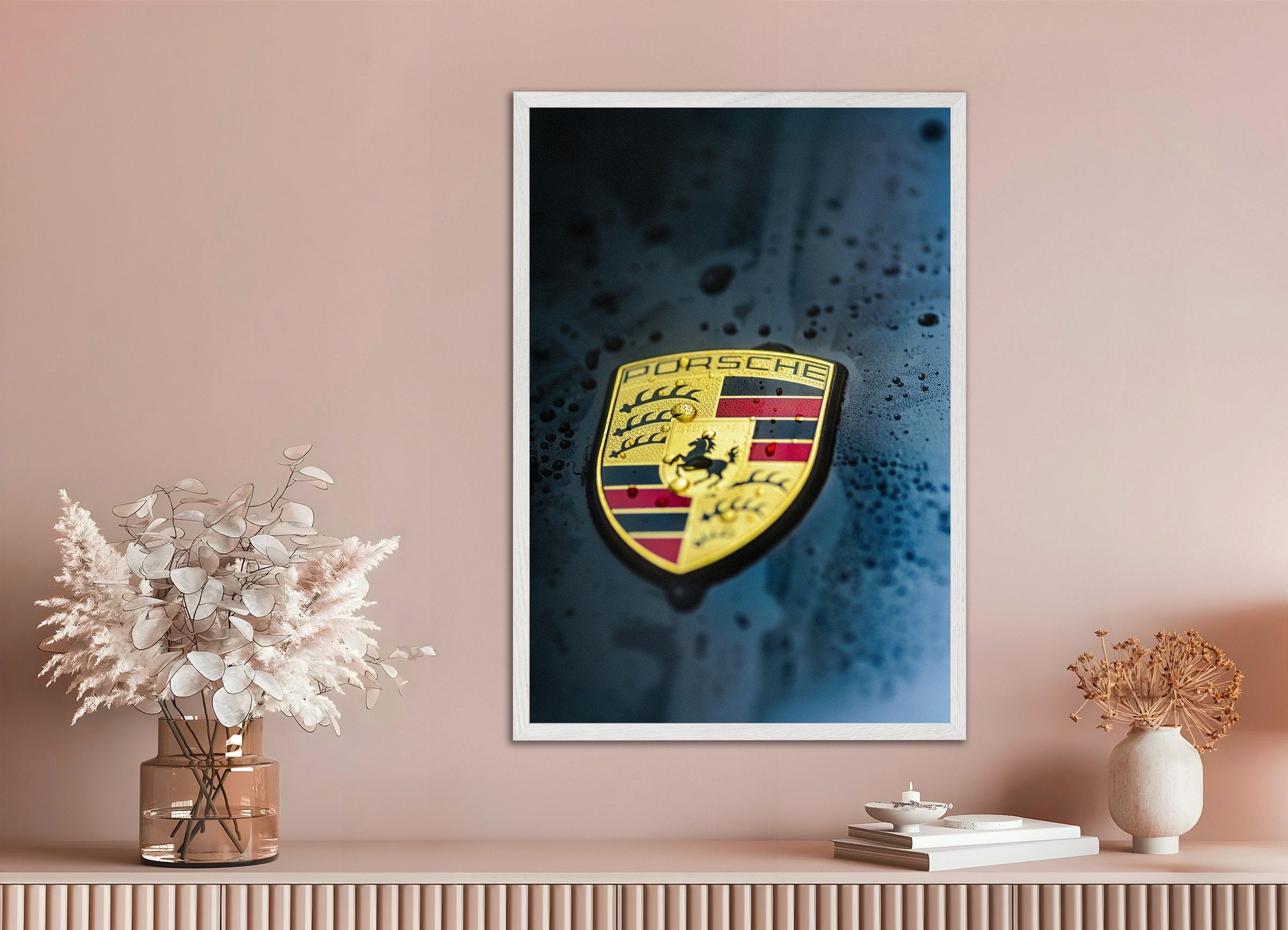 Poster of Porsche logo, with white wooden frame