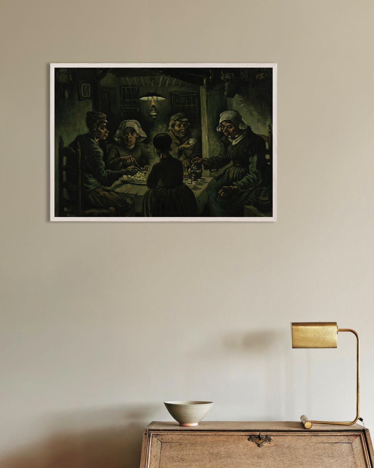 Poster med Potetspiserne (1885) av Vincent van Gogh, med hvit treramme