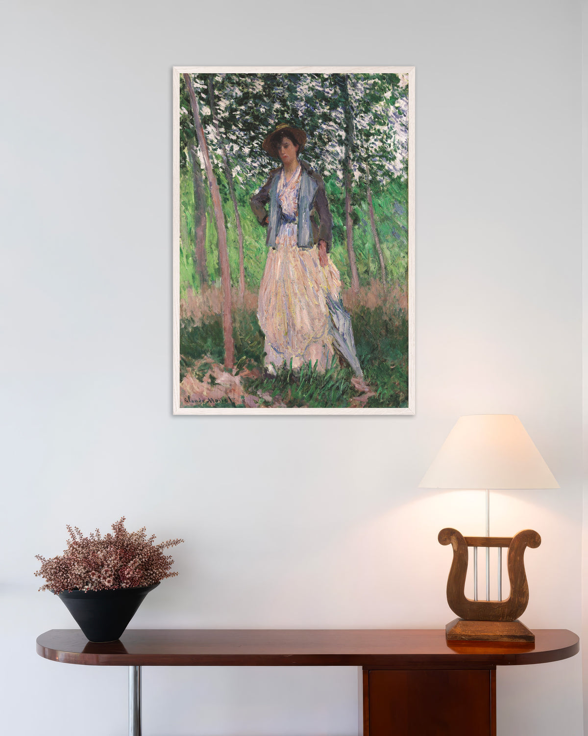 Poster of The Stroller, Suzanne Hoschedé (1887) by Claude Monet, with white wooden frame